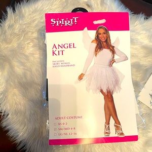 Angel Halloween costume with jumpsuit, angel jewels for face and fish net hose!